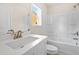 Bathroom featuring modern sink and bathtub with shower at 5443 Blossomwood Sw Trl, Mableton, GA 30126