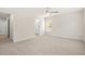 A large room with a ceiling fan, two doors and a window bringing in plenty of light at 5443 Blossomwood Sw Trl, Mableton, GA 30126