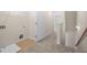 Upstairs carpeted hallway with laundry hookups and a closet at 5443 Blossomwood Sw Trl, Mableton, GA 30126