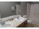 Bathroom with double sink vanity and a shower-tub combo at 7238 April Ct, Morrow, GA 30260