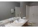 Bathroom with double sink vanity and a shower-tub combo at 7238 April Ct, Morrow, GA 30260