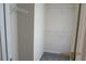 View of an empty closet with wire shelving and carpeting at 7238 April Ct, Morrow, GA 30260