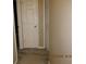 Hallway showing access to rooms in the home, with carpeting at 7238 April Ct, Morrow, GA 30260