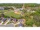 Aerial view of homes near a well-maintained baseball field, offering a blend of community and recreation at 100 Cottage Nw Walk, Cartersville, GA 30121