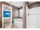 Bright bathroom featuring a tub, separate shower, and doorway to another bedroom at 100 Cottage Nw Walk, Cartersville, GA 30121
