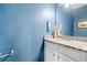 Comfortable bathroom showing granite countertop, white cabinetry, and decorative wall art at 100 Cottage Nw Walk, Cartersville, GA 30121