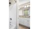 Bathroom with granite counters, double vanity, and a tub and shower combination in the corner at 100 Cottage Nw Walk, Cartersville, GA 30121