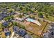 Aerial view of community pool area with playground and green space, a great place for fun and relaxation at 100 Cottage Nw Walk, Cartersville, GA 30121
