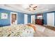 Comfortable main bedroom with ensuite bathroom access and a wooden dresser at 100 Cottage Nw Walk, Cartersville, GA 30121