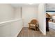 Cozy sitting area featuring a chair and carpet floors at 100 Cottage Nw Walk, Cartersville, GA 30121