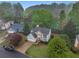 Stunning aerial view of a traditional home with landscaped yard and charming curb appeal at 4272 Glenlake Nw Dr, Kennesaw, GA 30144