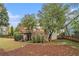 View of a home's deck, stairs, fence, and landscape at 4272 Glenlake Nw Dr, Kennesaw, GA 30144