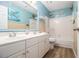 Coastal-themed bathroom with double vanity and a shower-tub combination at 4272 Glenlake Nw Dr, Kennesaw, GA 30144