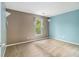Bedroom with two-tone walls and a window bringing in natural light at 4272 Glenlake Nw Dr, Kennesaw, GA 30144