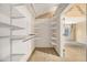 Walk-in closet with wire shelving and access to bedroom at 4272 Glenlake Nw Dr, Kennesaw, GA 30144