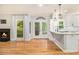 Open kitchen featuring granite countertops, stainless steel appliances, and a cozy breakfast bar at 4272 Glenlake Nw Dr, Kennesaw, GA 30144