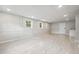 Finished basement featuring tile floors, recessed lighting, and a bar at 851 Rockbridge Sw Rd, Lilburn, GA 30047