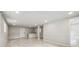 Finished basement features tile floors, bar and recessed lighting at 851 Rockbridge Sw Rd, Lilburn, GA 30047