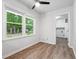 Bedroom with natural light and view of wooded yard at 851 Rockbridge Sw Rd, Lilburn, GA 30047