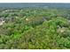 Lush green trees surround this beautiful neighborhood, offering peace and serenity at 881 Rockbridge Sw Rd, Lilburn, GA 30047