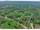 Expansive property spanning +/- 6 acres, offering privacy and natural beauty at 881 Rockbridge Sw Rd, Lilburn, GA 30047