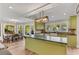 Eat-in kitchen with a large island, modern appliances, and an adjacent dining area with views at 10005 Lakeview Pkwy, Villa Rica, GA 30180