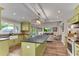 Well-lit kitchen area flows into a cozy living space, ideal for entertaining and everyday living at 10005 Lakeview Pkwy, Villa Rica, GA 30180