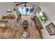Open-concept living room featuring vaulted ceilings, a ceiling fan and expansive sliding doors at 10005 Lakeview Pkwy, Villa Rica, GA 30180