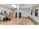 Basement office with custom desk, bar and putting green provides ample workspace at 10005 Lakeview Pkwy, Villa Rica, GA 30180