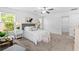 Well-lit primary bedroom with neutral walls, soft carpet, and bright decor at 1385 Vayda Ct, Marietta, GA 30066