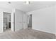 Neutral bedroom features carpet, light walls, and doors to a closet and bathroom at 1385 Vayda Ct, Marietta, GA 30066