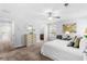 Sunlit Primary bedroom with carpet, soft decor, and ensuite bathroom access at 1385 Vayda Ct, Marietta, GA 30066