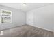 Bright bedroom with neutral carpet, a double closet, and natural light at 1385 Vayda Ct, Marietta, GA 30066