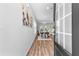 Inviting entryway that opens to dining and living room, featuring beautiful hardwood floors and natural light at 1385 Vayda Ct, Marietta, GA 30066