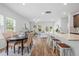 Bright living space with an open layout, showcasing kitchen, dining area, and living room with great natural light at 1385 Vayda Ct, Marietta, GA 30066