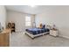 Cozy bedroom with a single bed, window, carpet and natural light at 2851 Fareed St, Douglasville, GA 30135
