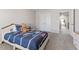 Comfortable bedroom with a twin bed, carpet, and access to the hallway at 2851 Fareed St, Douglasville, GA 30135