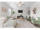 Bright and spacious living room featuring modern furnishings and stylish decor at 2851 Fareed St, Douglasville, GA 30135