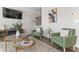 Spacious living room with stylish decor, modern furniture and lots of natural light at 2851 Fareed St, Douglasville, GA 30135