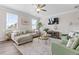 Bright living room with large windows, stylish decor, and comfortable seating at 2851 Fareed St, Douglasville, GA 30135