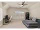 Bright room features vaulted ceiling, large windows, and a comfortable daybed at 3290 Camellia Ln, Suwanee, GA 30024