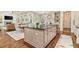 Kitchen view with large center island, stainless appliances, and open concept design at 3290 Camellia Ln, Suwanee, GA 30024