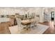 Eat-in kitchen features custom cabinets, stainless appliances, and a large center island at 3290 Camellia Ln, Suwanee, GA 30024
