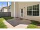 Concrete back patio with access to the home and a view of the fenced yard at 11151 Aliyah Dr, Hampton, GA 30228
