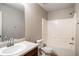 Standard bathroom featuring a single sink vanity, toilet, and shower-tub combination at 11151 Aliyah Dr, Hampton, GA 30228