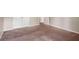 Wide angle bedroom with a view of a double door closet and a view to another room at 11151 Aliyah Dr, Hampton, GA 30228