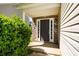 Inviting front door framed by stone accents and lush greenery at 11151 Aliyah Dr, Hampton, GA 30228