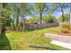 Spacious backyard with a large green lawn and a wooden fence at 1934 Westwood Sw Ave, Atlanta, GA 30310