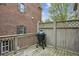 Back deck featuring a large grill and view of exterior brick elevation at 346 Ardmore Ct, Atlanta, GA 30309