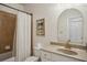 Bathroom featuring a vanity with stone countertop, toilet, and shower with tile at 346 Ardmore Ct, Atlanta, GA 30309